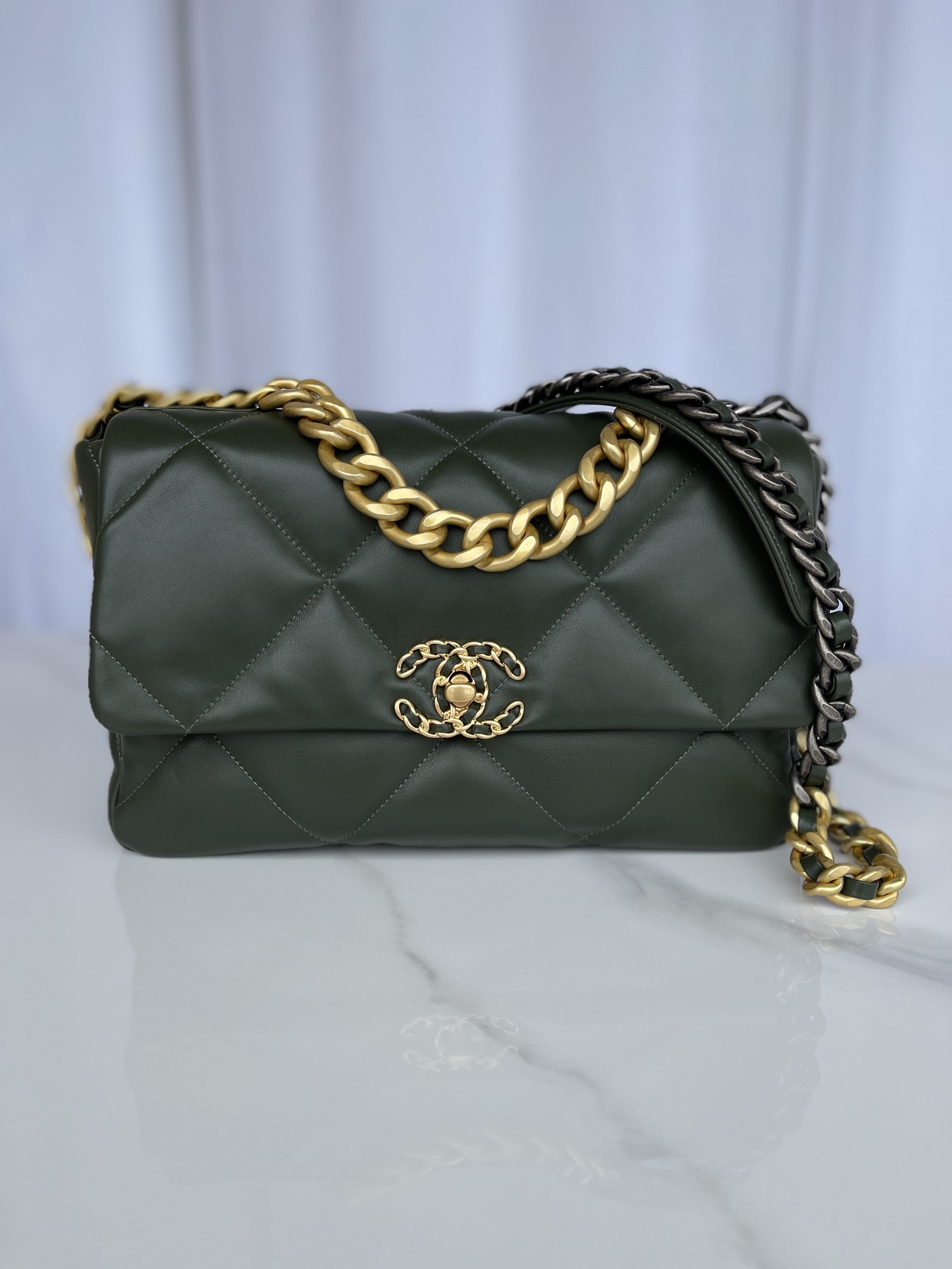 Ch*el 19 large handbag shiny leather, gold-tone, silver-tone & ruthenium-finish metal dark green 7.8 × 11.7 × 3.9 in